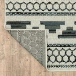 Trinity Geometric Patio Area Rug Beige/Blue - Captiv8e Designs -Safavieh Store GUEST 0dca5f37 e812 47b7 b874 76b8692d4f6c
